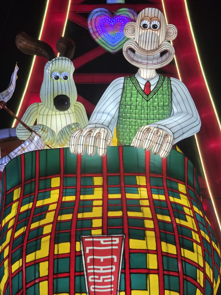 Iconic lantern from the Longleat Christmas Lantern Trail: Wallace and Gromit in a roller coaster slipper, a fun highlight of the event’s night displays.
